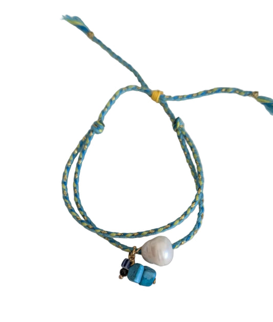 Pulsera de hilo turquesa